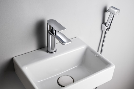 Bateria umywalkowa z prysznicem bidetowym, chrom