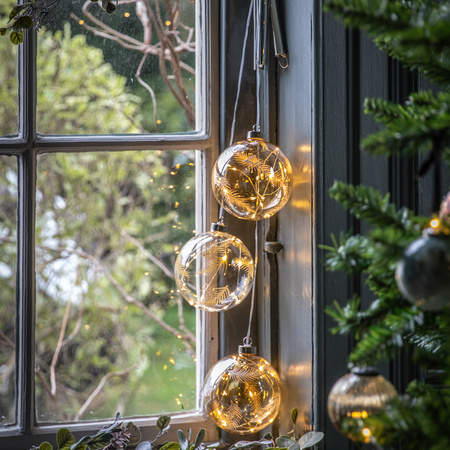 Kulka z wygrawerowanym piórkiem i bursztynowym światłem LED 120x120x140 mm